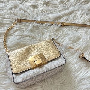Micheal Kors crossbody gold and white